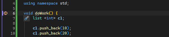 Screenshot, der den Debugger in Visual Studio an einem gesetzten Haltepunkt angehalten zeigt.